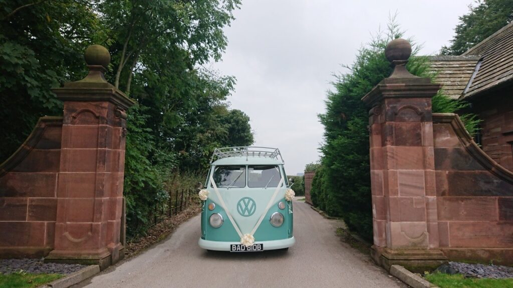 vw campervan parked outside wedding venue